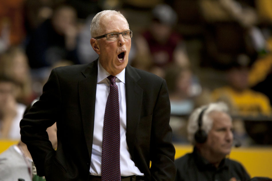 San Diego State coach Steve Fisher yells to his players during a NCAA men's basketball game on Tuesday, March 1, 2011, in Laramie, Wyo.