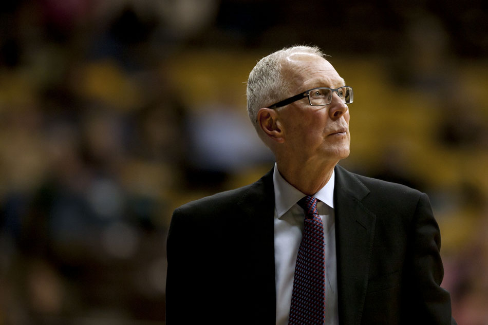 San Diego State coach Steve Fisher watches his team from the bench as they pull away from Wyoming Steve Fisher during the second half of a NCAA men's basketball game on Tuesday, March 1, 2011, in Laramie, Wyo.