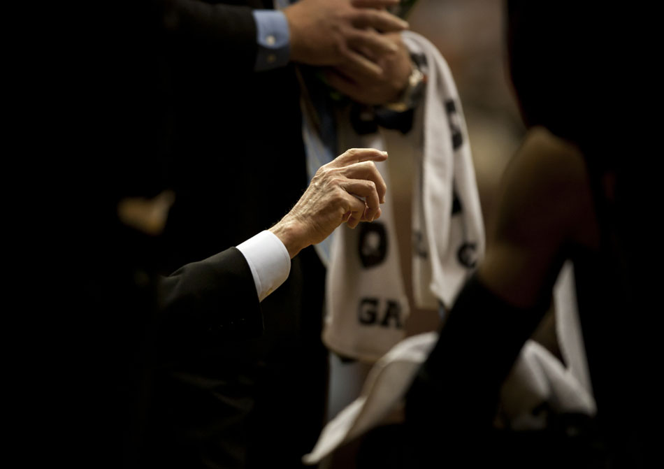 San Diego State coach Steve Fisher gestures with his hands as he talks to his players during the second half of a NCAA men's  basketball game on Tuesday, March 1, 2011, in Laramie, Wyo.