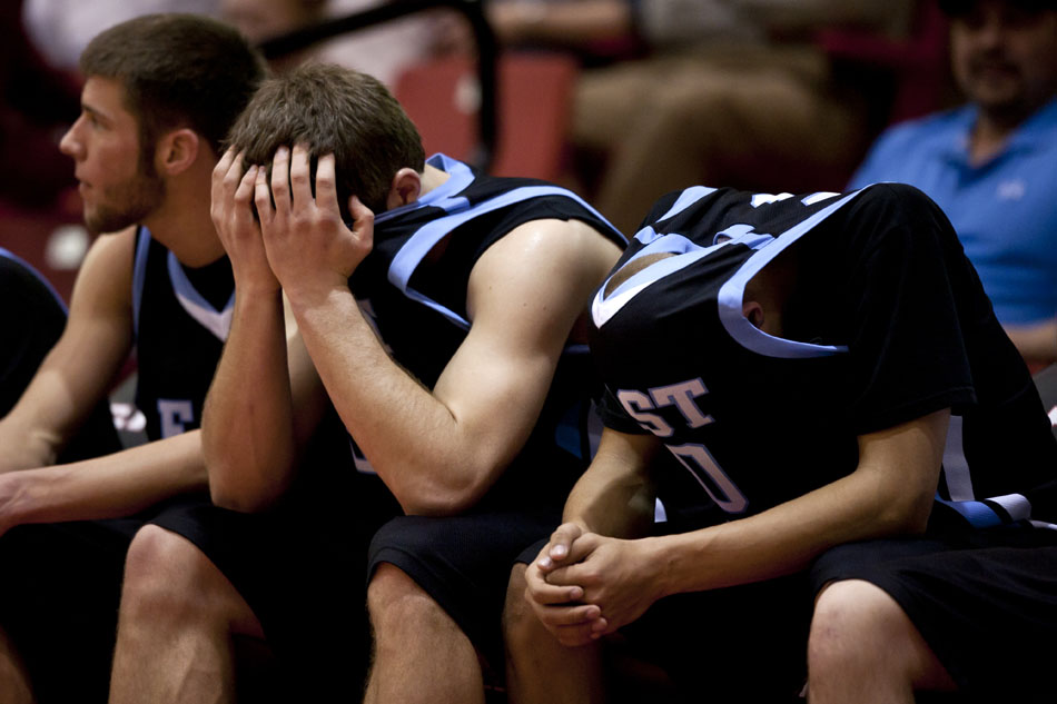 Cheyenne East's Trevon Hinker, left, and Derek Graves hang their heads after a 42-36 loss to Natrona County during a Class 4A boy's basketball state tournament game on Thursday, March 10, 2011, in Casper.