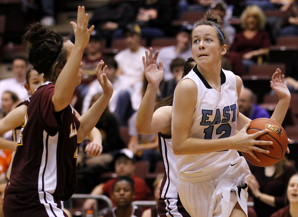 Cheyenne East's Sarah Erickson cuts to the basket to attempt a lay up during a Class 4A girl's basketball consolation final on Saturday, March 12, 2011, in Casper, Wyo.