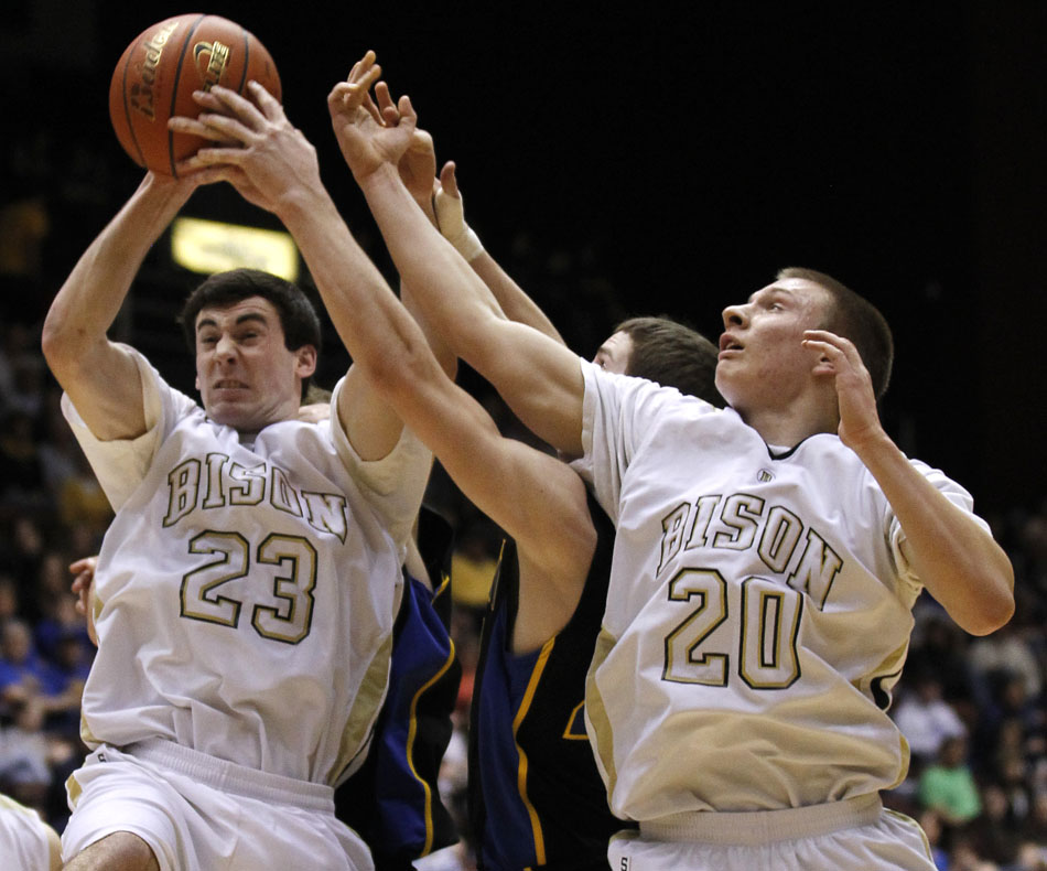 Buffalo's Kasey Esponda (23) and Cameron Ostrom during the Class 3A boy's basketball state championship game on Saturday, March 12, 2011, in Casper, Wyo.