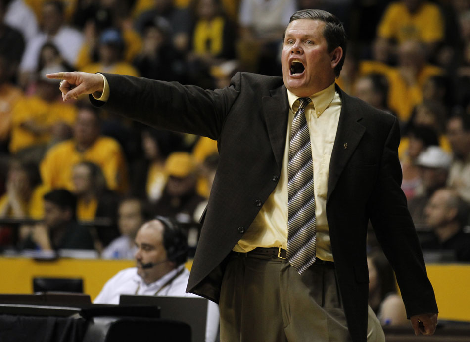 Wyoming coach Joe Legerski yells instructions to his players during a third round Women's NIT game on Thursday, March 24, 2011, in Laramie, Wyo.