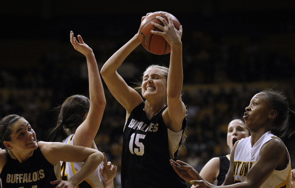 Colorado's Julie Seabrook (15) grabs a rebound during a third round Women's NIT game on Thursday, March 24, 2011, in Laramie, Wyo.
