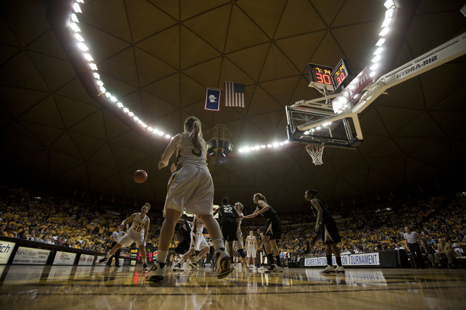 Wyoming's Randi Richardson (3) inbounds the ball during a third round Women's NIT game on Thursday, March 24, 2011, in Laramie, Wyo.