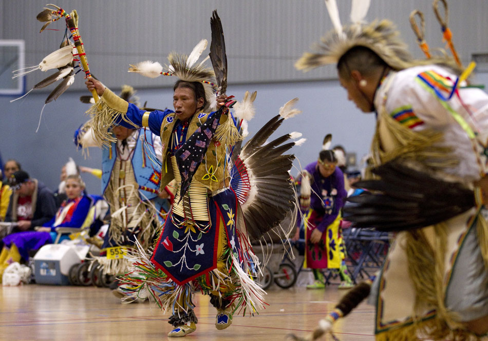 Tommy Wadena, of Fort Collins, Colo., performs in a men's traditional dance demonstration during a powwow held by the Southeast Wyoming Inter-Tribal Powwow Association (SEWIPA) on Saturday, March 26, 2011, at Laramie County Community College in Cheyenne.