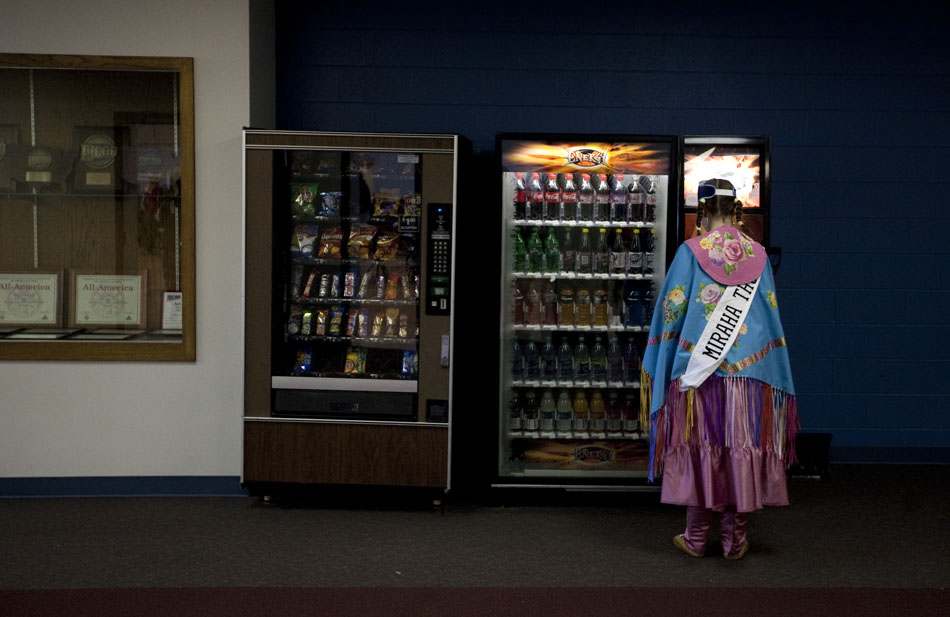 Miraha Thurston takes a break to buy a Dr. Pepper during a traditional powwow held by the Southeast Wyoming Inter-Tribal Powwow Association (SEWIPA) on Saturday, March 26, 2011, at Laramie County Community College in Cheyenne.