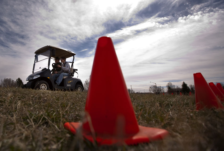 Cheyenne East junior Jeff Waganowsky drives through an obstacle course wearing drunk goggles with Wyoming Highway Patrol trooper Gabe Testerman on Tuesday, April 12, 2011, at Cheyenne East High School. Troopers demonstrated the effects of drunk driving at the school as many students prepare for the prom on Saturday.