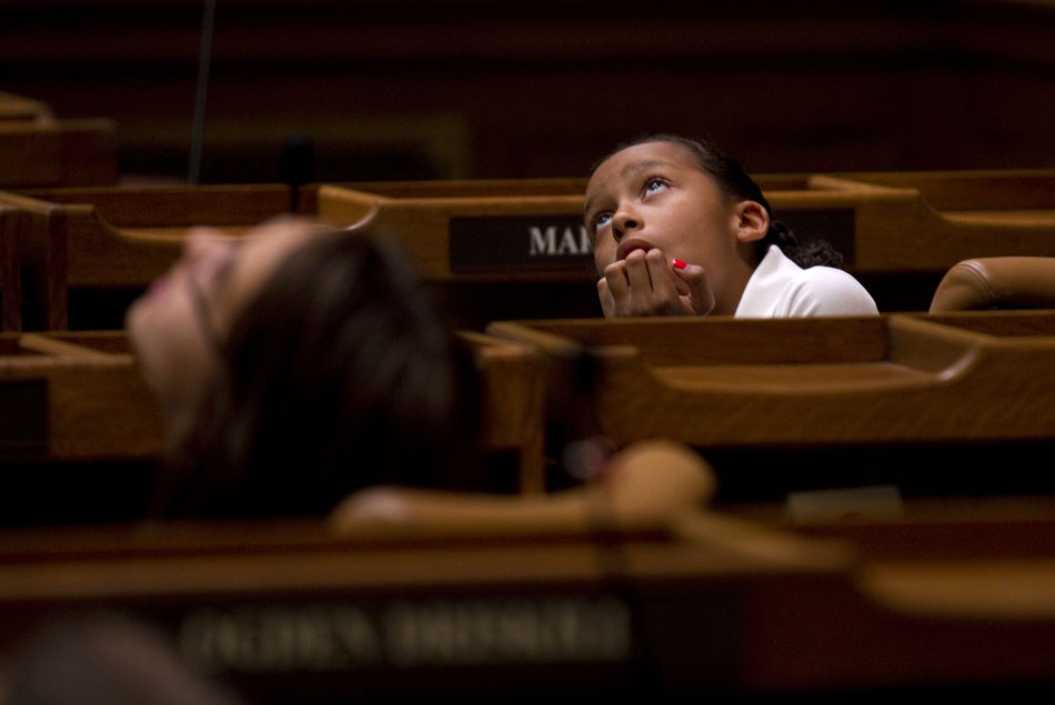 McKenzie Harris, a fifth grader at Freedom Elementary, peers up at a stained glass ceiling as Sen. Tony Ross, R-Cheyenne, not pictured, explains the Senate chambers on Tuesday, April 26, 2011, at the Wyoming State Capitol.