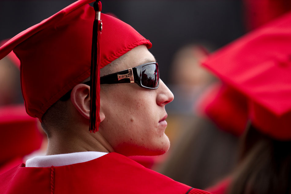 Zackary Mondello listens to a speaker during Cheyenne Central's graduation ceremonies on Friday, May 27, 2011, at Frontier Park.