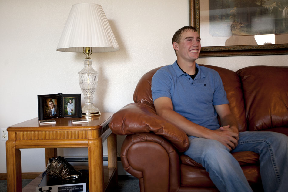 Brandon Nimmo shares a laugh as he's interviewed on Tuesday, June 21, 2011, in the living room of his parents' Cheyenne, Wyo. home. The New York Mets selected Nimmo No. 13 overall in the first round of this year's MLB draft. Now the recent high school grad must decide whether to go pro or accept an offer to play baseball at Arkansas in the fall. (James Brosher / Special to New York Post)