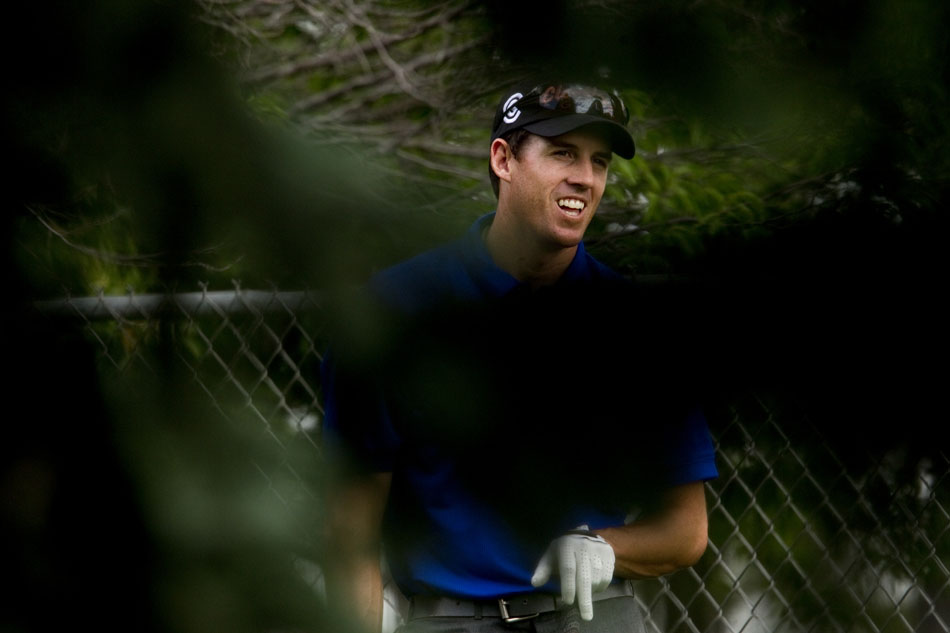 Kane Webber shares a laugh with his fellow golfers as he waits to tee off on No. 5, a 320-yard par 4 during the second round of the Wyoming Open on Saturday, July 9, 2011, at the Airport Golf Course in Cheyenne, Wyo. Webber's tee shot barely missed the green, landing on a hill a few feet from the putting surface.
