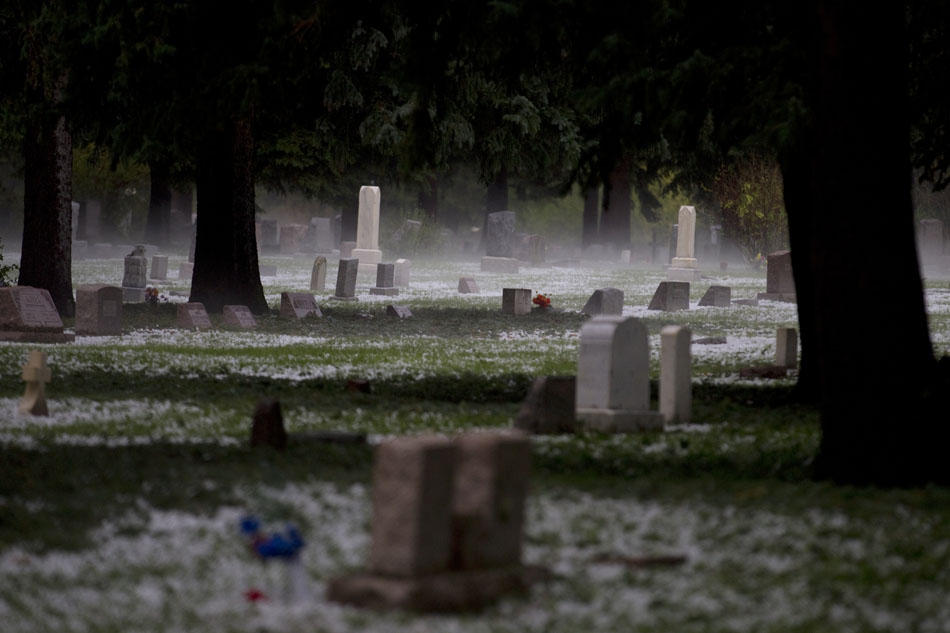 Fog rises from the ground after a thunderstorm dumped hail on Tuesday, July 12, 2011, at Lakeview Cemetery in Cheyenne.