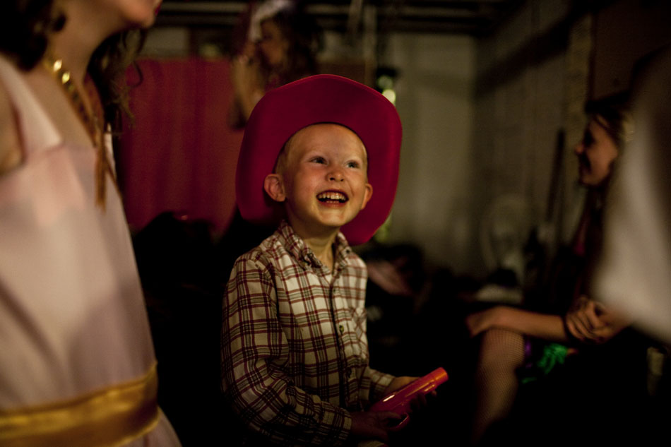 Colin Threewitt, 5, the son of assistant director Amy Threewitt, shares a laugh with cast member James Wagner after Threewitt pretended to shoot Wagner repeatedly with a toy gun before the opening night of the 55th Old Fashioned Melodrama on Thursday, July 14, 2011, at the Atlas Theatre in Cheyenne. The melodrama continues through Aug. 7.