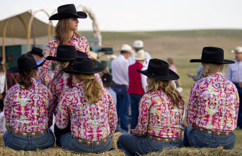 Members of the Dandies wait for the start of the Cheyenne Frontier Days cattle drive on Sunday, July 17, 2011, north of Cheyenne.