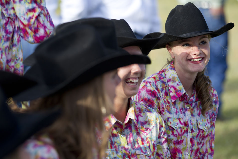 Members of the Dandies share a laugh as they talk to Cheyenne Frontier Days royalty during the CFD cattle drive on Sunday, July 17, 2011, north of Cheyenne.