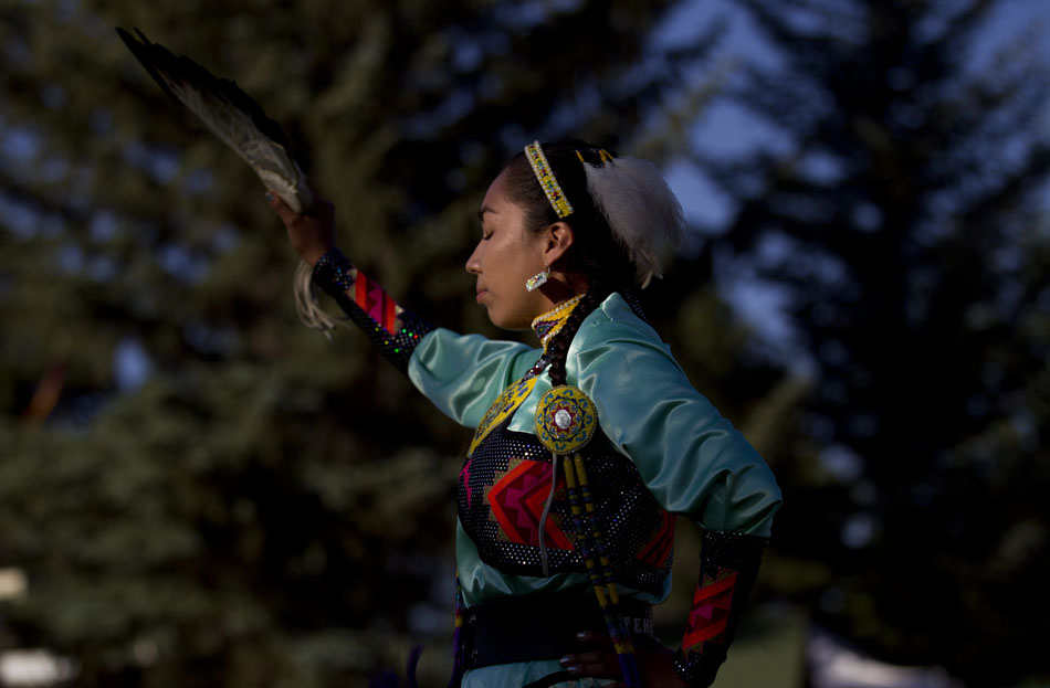 Toni Valdez performs a traditional women's jingle dance during Cheyenne Frontier Days on Saturday, July 23, 2011, in the Indian Village at Frontier Park.