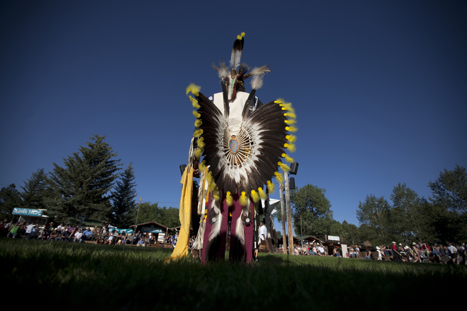 Pat Iron Cloud stands inside a dancing circle as he is introduced by his wife, Sandy Iron Cloud, before a dancing demonstration during Cheyenne Frontier Days on Saturday, July 23, 2011, in the Indian Village at Frontier Park.