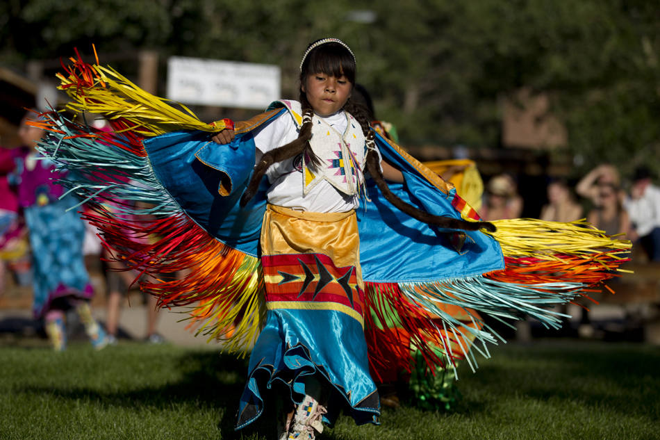 Elizabeth Valdez, 9, dances during Cheyenne Frontier Days on Saturday, July 23, 2011, in the Indian Village at Frontier Park.