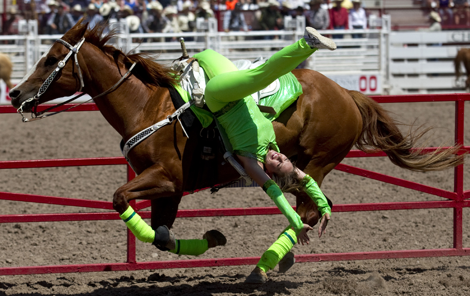 Trick rider Kellie Brown performs during the Cheyenne Frontier Days rodeo on Friday, July 29, 2011, at Frontier Park.