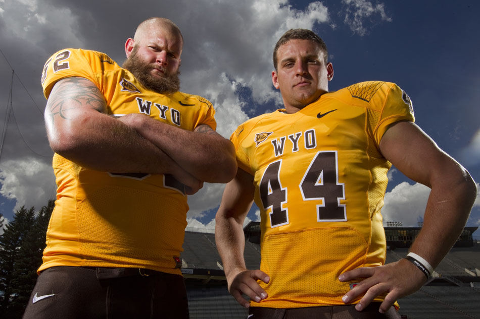 Wyoming defensive ends Gabe Knapton, left, and Josh Biezuns pose for a portrait during the University of Wyoming's media day on Saturday, Aug. 6, 2011, at Memorial Stadium in Laramie.