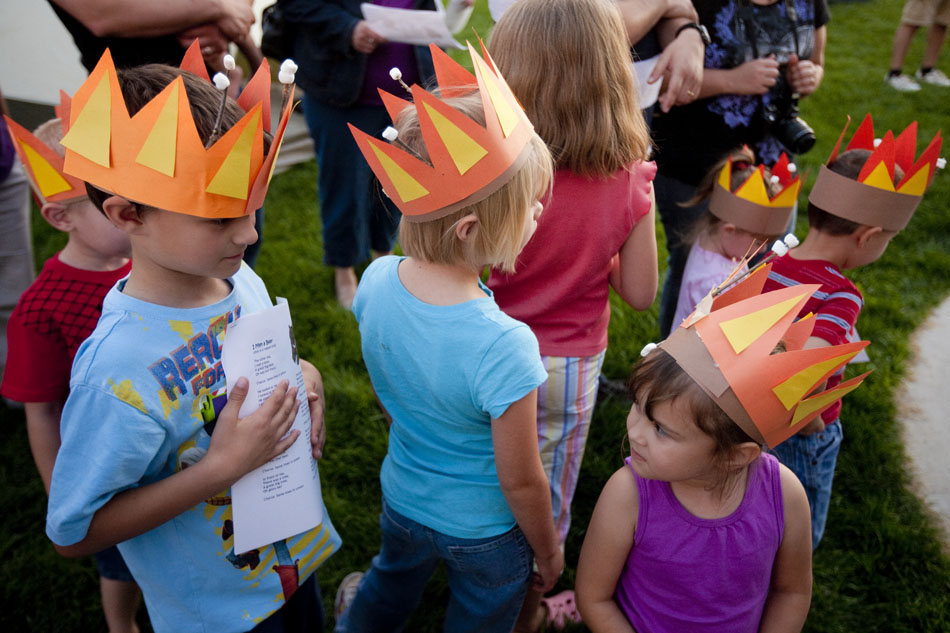Kids wait in line to roast mashmellows during a camping event on Thursday, Sept. 1, 2011, at the Laramie County Library.