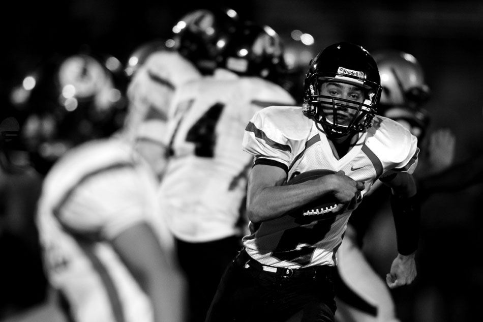 Cheyenne Central quarterback Kyler Robinson navigates through the Cheyenne South defense on a run during a Class 4A football game on Friday, Sept. 2, 2011, at Cheyenne South High School. Robinson broke off a long run and scored a touchdown on the play.