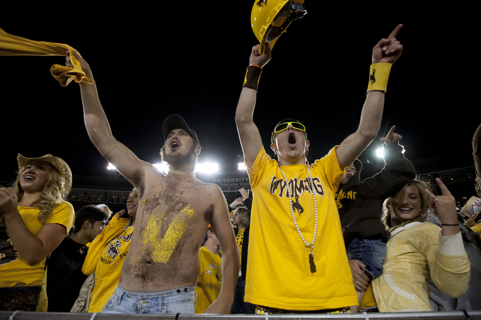 Wyoming fans celebrate a 35-32 win over Weber State on Saturday, Sept. 3, 2011, at War Memorial Stadium in Laramie, Wyo.