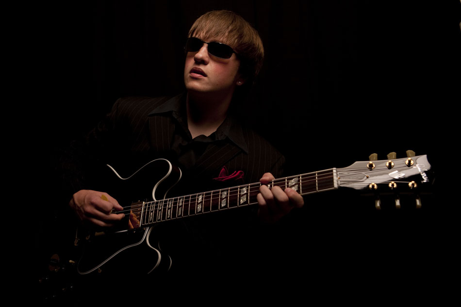 Taylor Scott, the 18-year-old guitarist and vocalist for the Cheyenne-based blues band Another Kind of Magick, poses for a portrait with his Gibson Custom ES 345 guitar on Friday, Sept. 30, 2011, in Cheyenne. Scott, who owns 12 guitars, is set to record a live album with his group on Nov. 11 at The Plains Hotel in downtown Cheyenne.