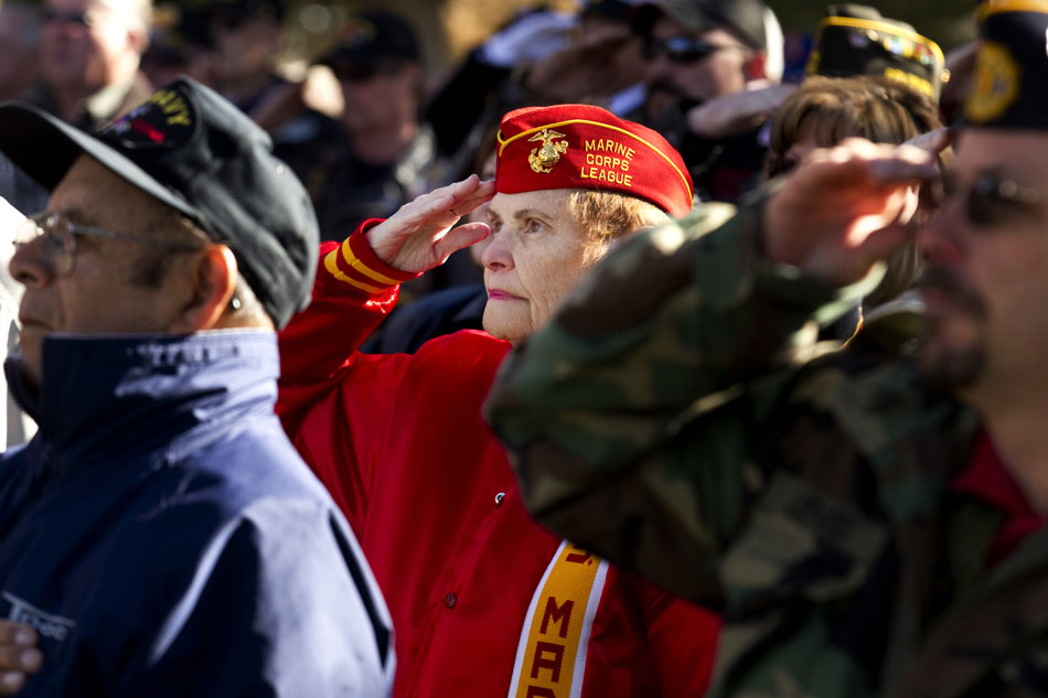 Lois Hefley salutes during a Veteran's Day ceremony on Friday, Nov. 11, 2011, at Beth El Cemetery in Cheyenne. Sanders is a veteran of the Vietnam War.
