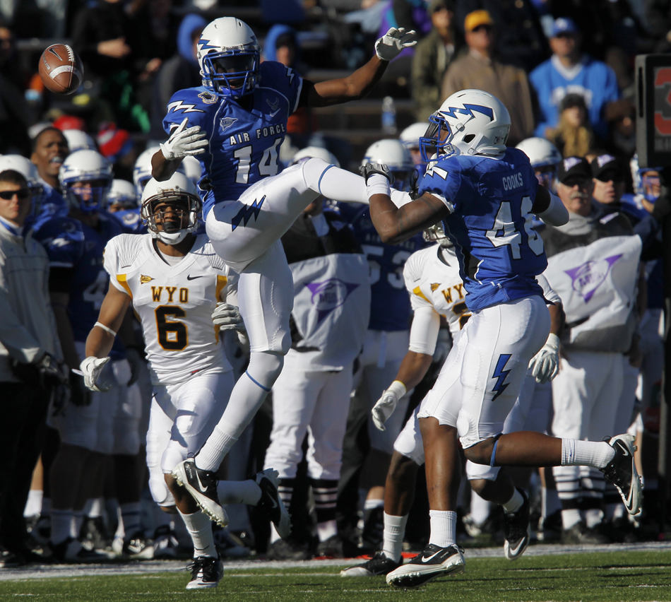 Air Force defensive back Josh Hall (14) misses a would-be interception before halftime in a NCAA college football game on Saturday, Nov. 12, 2011, at Falcon Stadium in Colorado Springs, Colo.