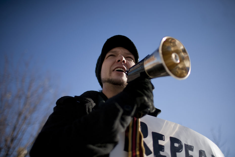 Forrest King leads protestors in a chant against corporations during Occupy Cheyenne on Saturday, Dec. 10, 2011, at the Depot Plaza in Cheyenne.