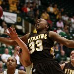 Wyoming forward Chaundra Sewell (33) reacts as a Colorado State defender strips the ball away from her during a game on Saturday, Feb. 5, 2011, in Fort Collins. (James Brosher/Wyoming Tribune Eagle)