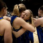 Wheatland's Muira Bunker, center, celebrates with her teammates after a 47-41 win against Buffalo in the Class 3A girl's basketball state championship game on Saturday, March 12, 2011, in Casper, Wyo. (James Brosher/Wyoming Tribune Eagle)
