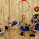 Wheatland's Shaya Irvine, top right, grabs a rebound during the first half of the Class 3A girl's basketball state championship game against Buffalo on Saturday, March 12, 2011, in Casper, Wyo. (James Brosher/Wyoming Tribune Eagle)