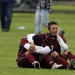 Laramie's Ian Muller (3) shares a moment with a teammate after a 2-1 loss to Sheridan in the Class 4A boy's state soccer championship game on Saturday, May 21, 2011, in Sheridan, Wyo. (James Brosher/Wyoming Tribune Eagle)