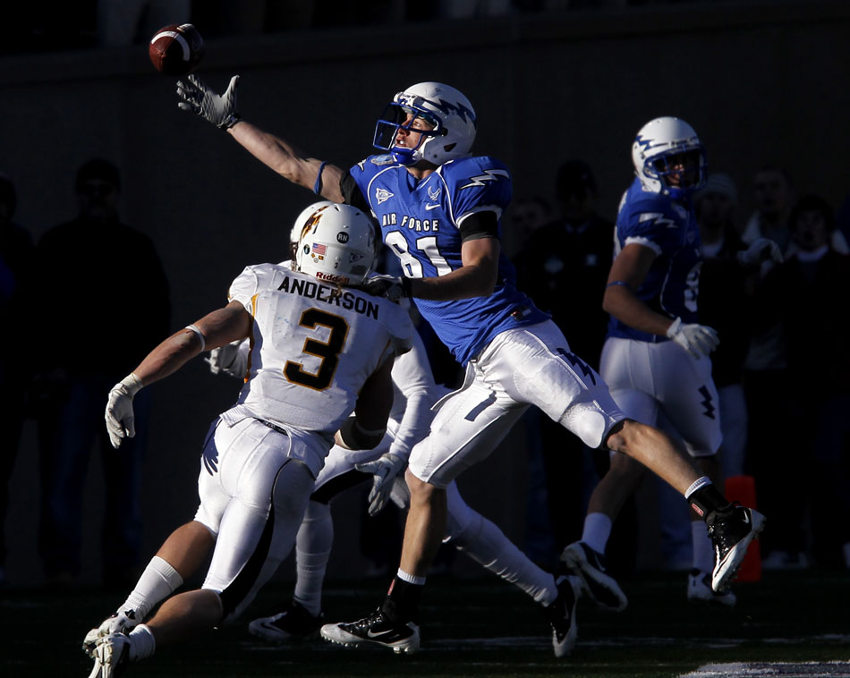 The ball sails just out of reach of Air Force tight end Joshua Freeman (81) in the closing minutes of a 25-17 loss to Wyoming in a NCAA college football game on Saturday, Nov. 12, 2011, at Falcon Stadium in Colorado Springs, Colo. (James Brosher/Wyoming Tribune Eagle)