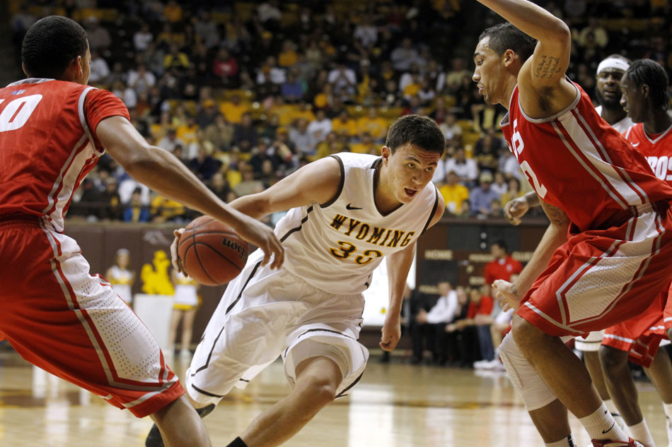 Wyoming guard Francisco Cruz drives into the New Mexico defense during a NCAA men's basketball game on Saturday, Jan. 14, 2012, at the Arena-Auditorium in Laramie, Wyo. Wyoming lost 72-62. (James Brosher/Wyoming Tribune Eagle)