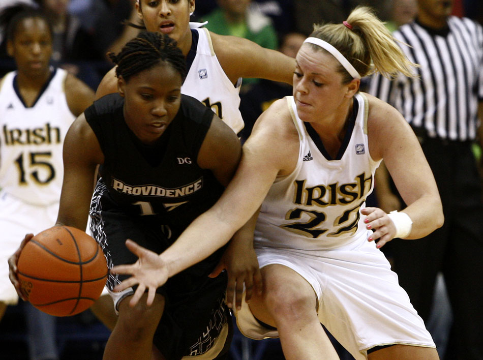 Notre Dame guard Brittany Mallory tries to steal the ball away from Providence guard Tori Rule during a women's NCAA college basketball game on Tuesday, Feb. 14, 2012, at Notre Dame. (James Brosher/South Bend Tribune)