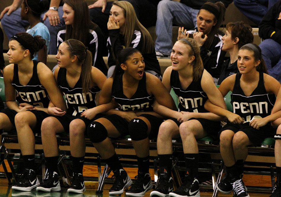 The Penn bench reacts to the game during a Class 4A basketball regional against Michigan City on Saturday, Feb. 18, 2012, at Valparaiso High School. Penn won 59-55. (James Brosher/South Bend Tribune)