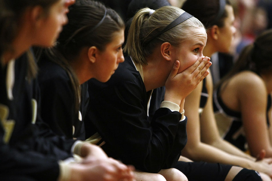Penn's Kourtney Sappenfield watches the closing minutes of a 65-50 loss to North Central from the bench during the Class 4A girl's semi-state basketball game on Saturday, Feb. 25, 2012, at Warsaw High School. (James Brosher/South Bend Tribune)