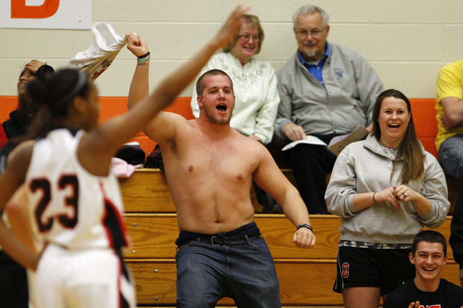 A North Central fan tries to distract a Penn player during a free-throw attempt in the Class 4A girl's semi-state basketball game on Saturday, Feb. 25, 2012, at Warsaw High School. (James Brosher/South Bend Tribune)