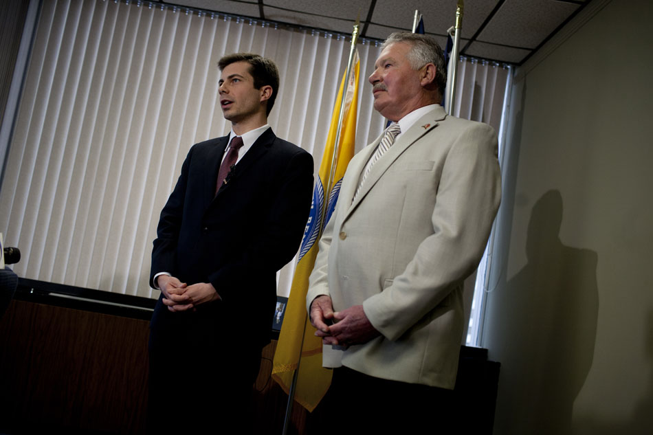 South Bend mayor Pete Buttigieg, left, answers a question during a news conference announcing deputy coroner Chuck Hurley, pictured at right, as the interim South Bend Police Department chief on Friday, March 30, 2012, in the mayor's downtown office. Buttigieg accepted Darryl Boykins' resignation on Thursday night following a federal investigation into wiretapping practices by the department. Buttigieg said he was advised by legal council to not elaborate on the investigation, which he was made aware of in late January. (James Brosher/South Bend Tribune)