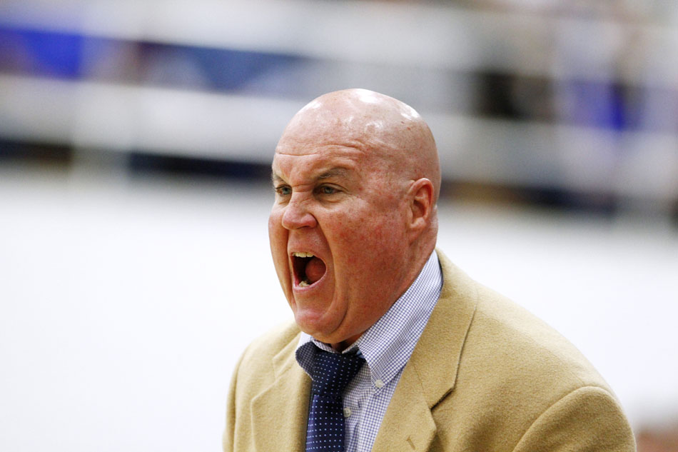 Adams coach Milt Cooper yells to his players during a Class 4A basketball regional semi-final on Saturday, March 10, 2012, at Michigan City High School. (James Brosher/South Bend Tribune)