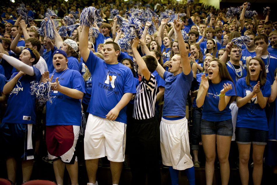 Mishawaka Marian students cheer on their team during a Class 3A semistate on Saturday, March 17, 2012, at Huntington North High School in Huntington, Ind. (James Brosher/South Bend Tribune)