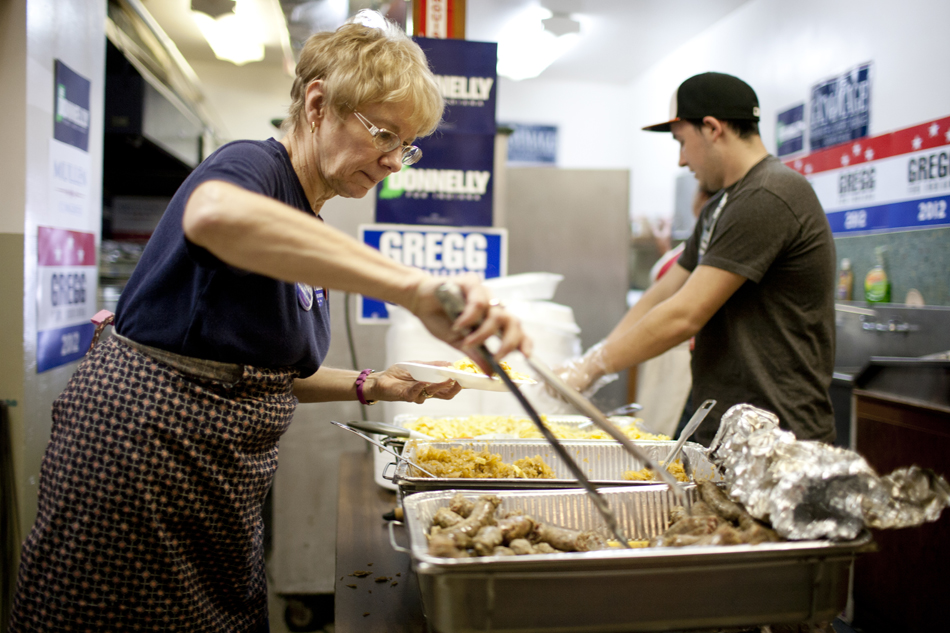 Shotsie Karasiak, left, prepares a traditional Polish meals during Dyngus Day on Monday, April 9, 2012, at the West Side Democratic Club in South Bend.