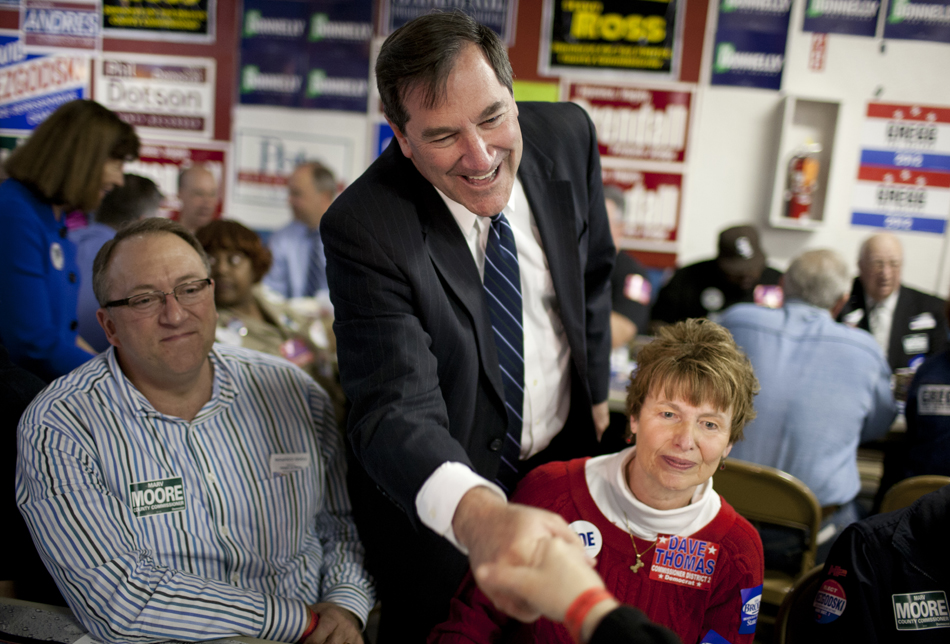 U.S. Rep. Joe Donnelly, D-Ind., shakes hands during Dyngus Day on April 9, 2012, at the West Side Democratic Club in South Bend. Donnelly is running for Indiana's U.S. Senate seat currently held by Republican incumbent Richard Lugar.