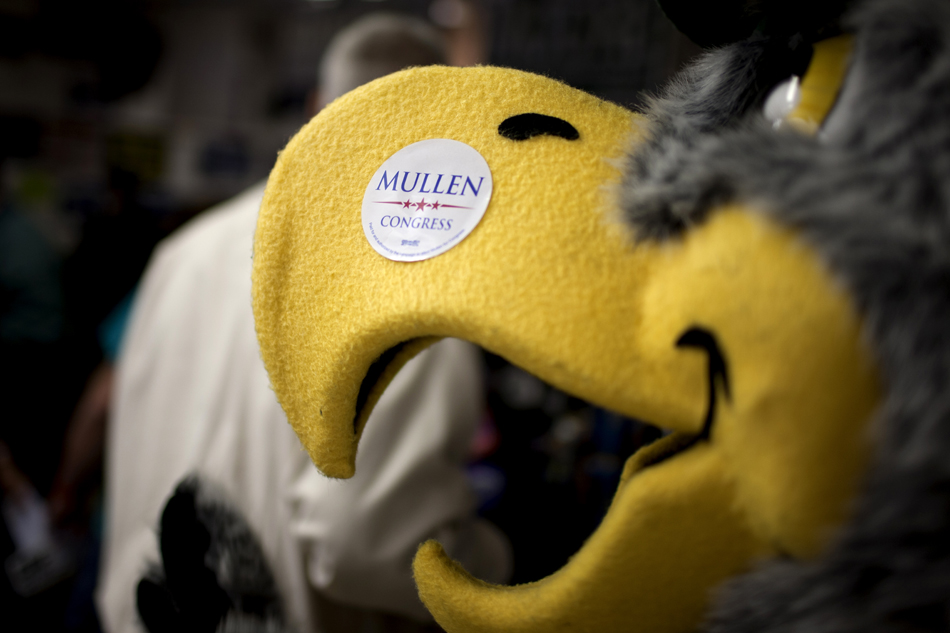 Swoop, the South Bend Silver Hawks mascot, walks the crowd with a Brendan Mullen sticker during Dyngus Day on Monday, April 9, 2012, at the West Side Democratic Club in South Bend. Mullen is seeking the Indiana's 2nd congressional district seat.