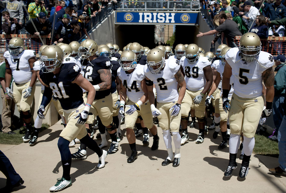 The Fighting Irish take the field for the Notre Dame Blue Gold game on Saturday, April 21, 2012, at Notre Dame. (James Brosher/South Bend Tribune)