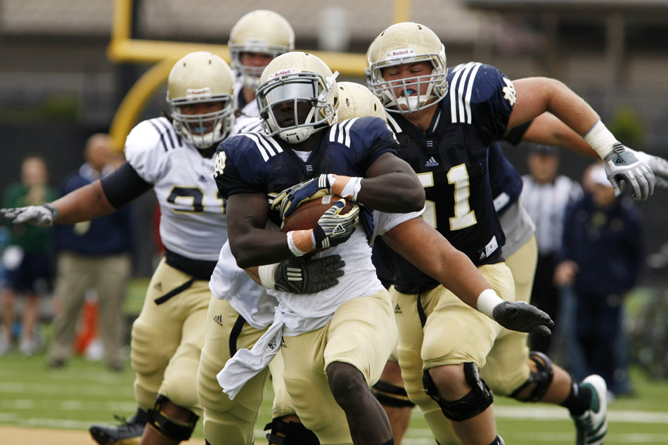 Notre Dame running back Cierre Wood breaks off a run during a football practice on Saturday, April 14, 2012, at Notre Dame. (James Brosher/South Bend Tribune)